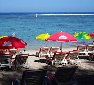 Verleih von Schirmen und Liegen