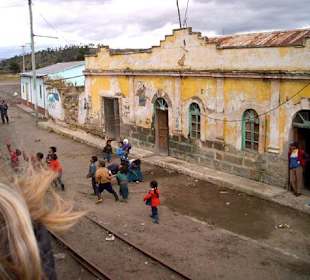 For sweets begging children at the train tour