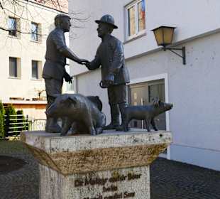 Der Bauer und der Metzger beim Handel