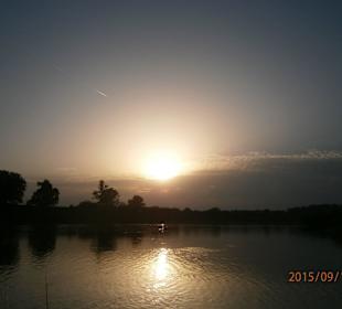 Sun setting in the clouds