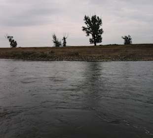 The narrow portion with strong flow