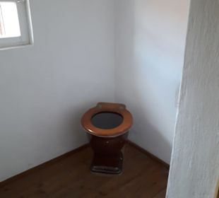 'verbesserte Toilette'