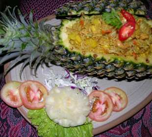 Fried rice with chicken in pineapple