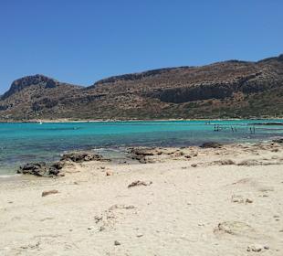 Blau-türkis und weißer Sand