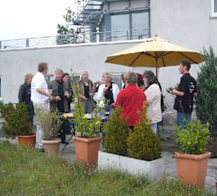 Umtrunk auf dem Dach