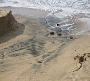 Strand nach Regenfall