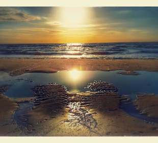 De Koog Texel Sonnenuntergang bei Ebbe