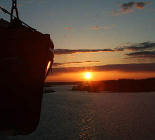 Wschód słońca na promie