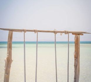 Just a swing away... relax on the beach 