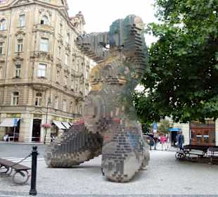 Plastik einer knieenden Frau