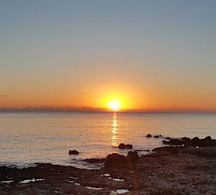 Sonnenaufgang vom Strand aus, direkt vor dem Hotel