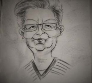 Werk des Karikaturisten am Sonntagsmarkt