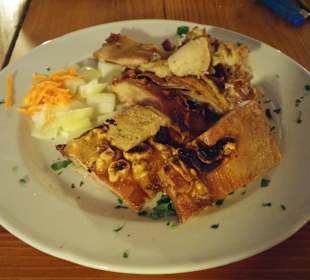 Spanferkel mit Zwiebeln