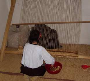 Weberin im Musterhaus