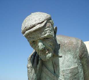 Alter Fischer - Skulptur auf der Promenade