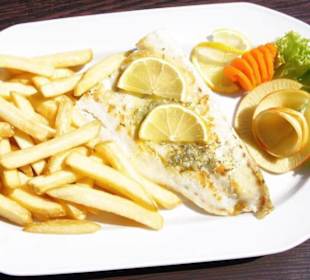 Filet z dorsza z masełkiem ziołowym.