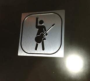 Schild an der Toilettentür