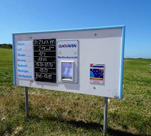 Wetteranzeige am Strand von Döse