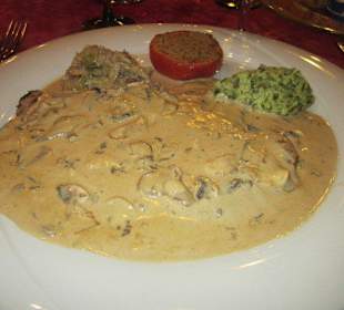 Kalbsschnitzel an Champignons
