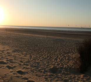 Sonnenuntergang am Sandstrand von Döse