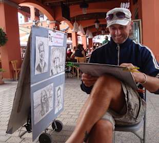 Karikaturist am Sonntagsmarkt