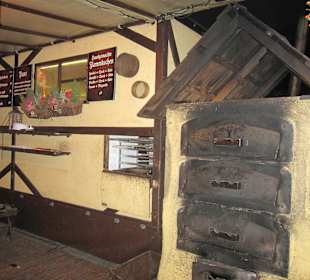 Weihnachststand mit Backofen