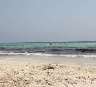 Strand mit wechselnen Gesicht