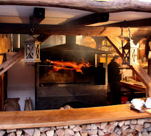 Spanferkel am Spieß