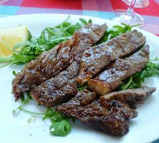 Bistecca di manzo con rucola