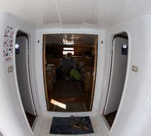 Entry to living room and shower / toilets