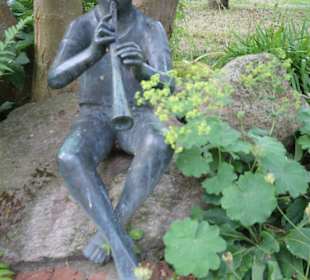 Der Flötenspieler am Teich