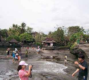 Vorsicht auf den nassen Steinen