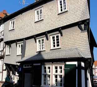 Holzschindeln und Fachwerk