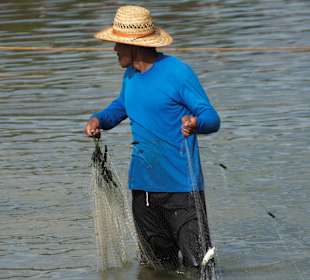 Fischer im Bang Niang River