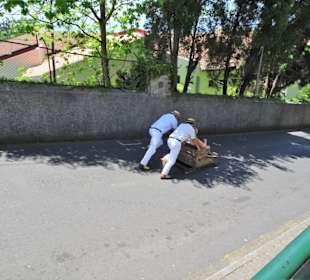 Impressionen von der Abfahrt der Korbschlitten