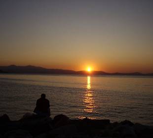 Sonnenuntergang mit Angler