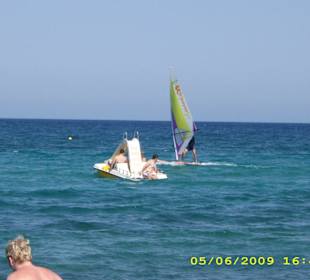 Surfen und Trettboot