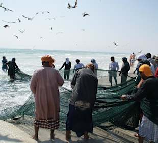 Strandfischer am Strand nahe Salalah