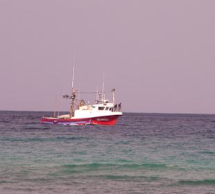 Fischerboot bei Abendstimmung