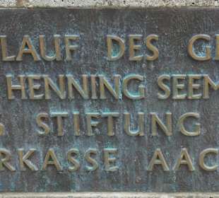 Kreislauf des Geldes, Brunnen beim Elisengarten