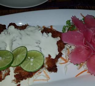 Paniertes Hühnchenfleisch mit Citronensouse