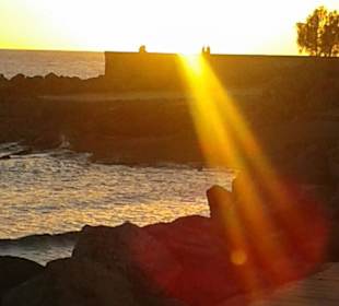 Sonnenuntergang vom EL Senador aus am Strand