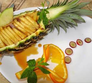 Flambierte Ananas im Restaurant Le Grilladin