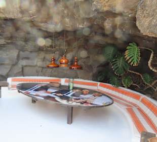 Sitzgelegenheit in den Felsen 