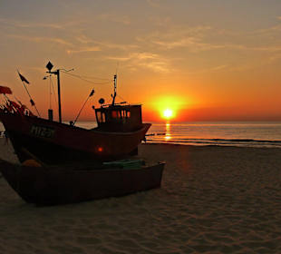 Kuter podczas zachodu słonca