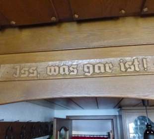 Spruch oberhalb der Theke